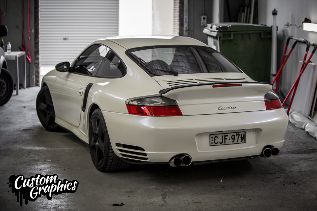 Porsche vinyl wrap in pealwhite