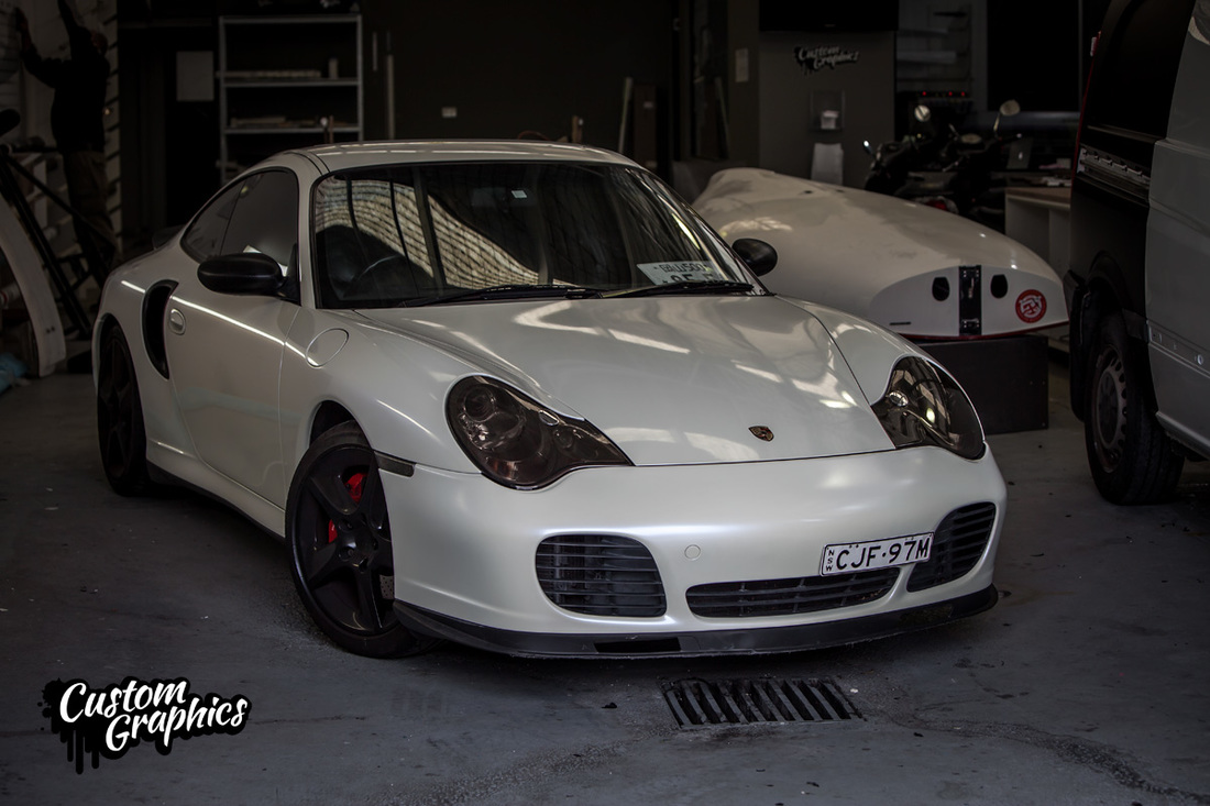 Porsche vinyl wrap in pealwhite